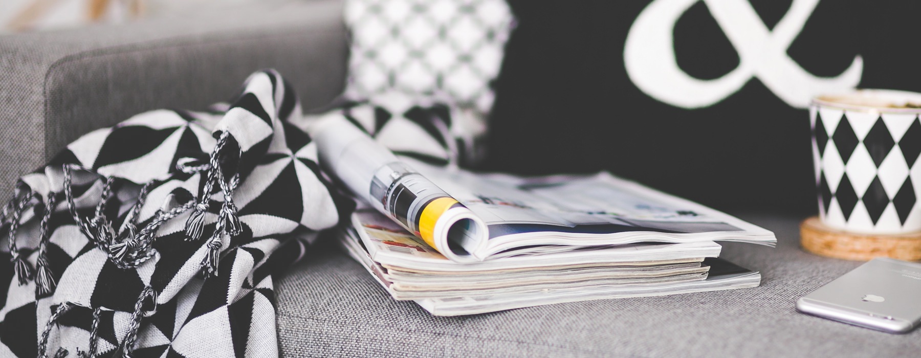 magazines and coffee cup